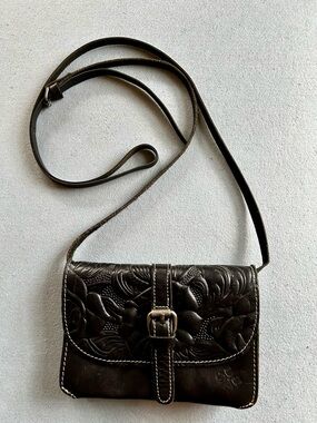 Patricia Nash Black Tooled Leather Crossbody with Buckle, adjustable strap